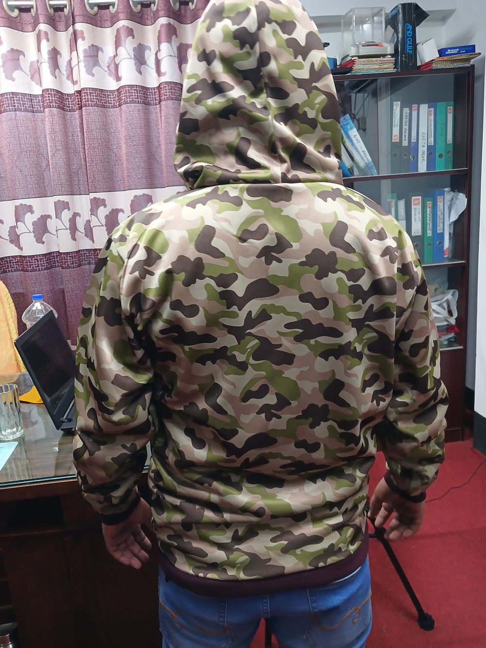 Military grade camouflage hoodie back view - factory testing by manufacturer